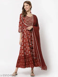 Yellow Cloud printed and embroidered flared cotton gown with chiffon dupatta (rust), featuring hand dori work, gota embellishments, and round neck with three-quarter sleeves. Indian ethnic wear tailored from cotton
