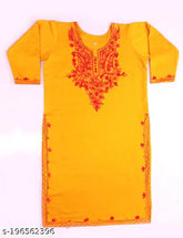 Trendy mustard woolen winter kurti with embroidered detailing and three-quarter sleeves, premium quality Indian handcraft
