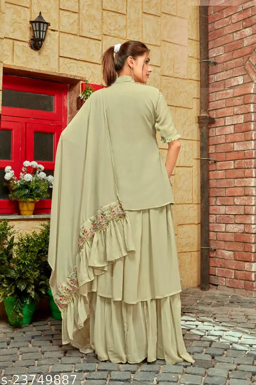 Light green faux Georgette semi-stitched top with unstitched santoon bottom, embroidered flared dress gown (India)