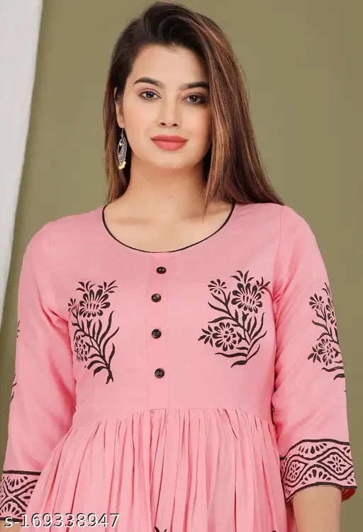 Rayon hand block printed kurti with three-quarter sleeves, vibrant Indian pattern for women's fashion. S (36in bust, 50in length), M (38in bust, 50in length), L (40in bust, 50in length), XL (42in bust, 50in length), XXL (44in bust, 50in length), XXXL (46in bust, 50in length)