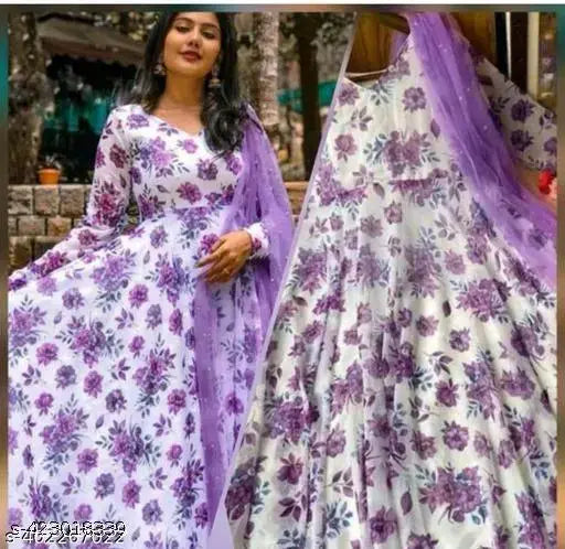 Printed silk designer gown with net dupata, long sleeves, vibrant Indian fabric on display