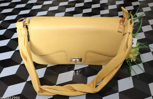 Light yellow synthetic slingbag with removable straps, featuring a single compartment and self-design pattern. Spacious and stylish handbag for women, ideal for everyday use with a capacity of approximately 3 liters (15 cm x 28 cm x 7 cm). Made in India
