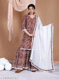 Elegant cotton kurti, sharara dupatta set with floral print and lace trim, perfect for parties or festive occasions