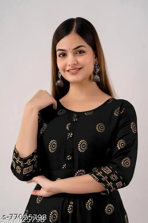 Green rayon three-quarter sleeve printed kurti for festive and party wear, ideal for casual, office, and events. Perfect for card parties and weekend gatherings. Team with accessories to look attractive. Kurti showcases rich desi style