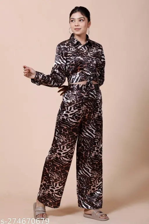 Women's satin leopard coord set, leopard print top and pants made from soft satin fabric