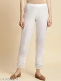 Solid white cotton trousers for women, Indian-made fashion pants on mannequin