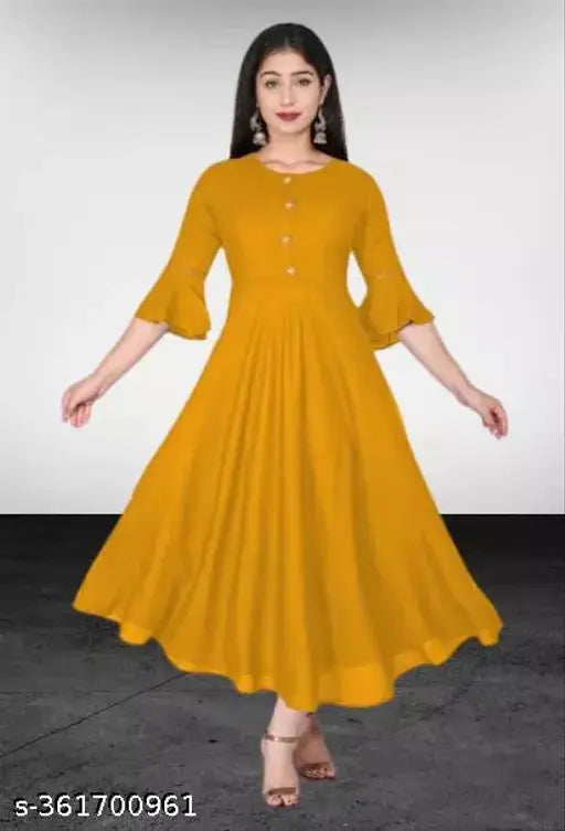 Stylish mustard rayon Anarkali kurti with gown flare, three-quarter sleeve, round flared silhouette for women's casual and formal wear