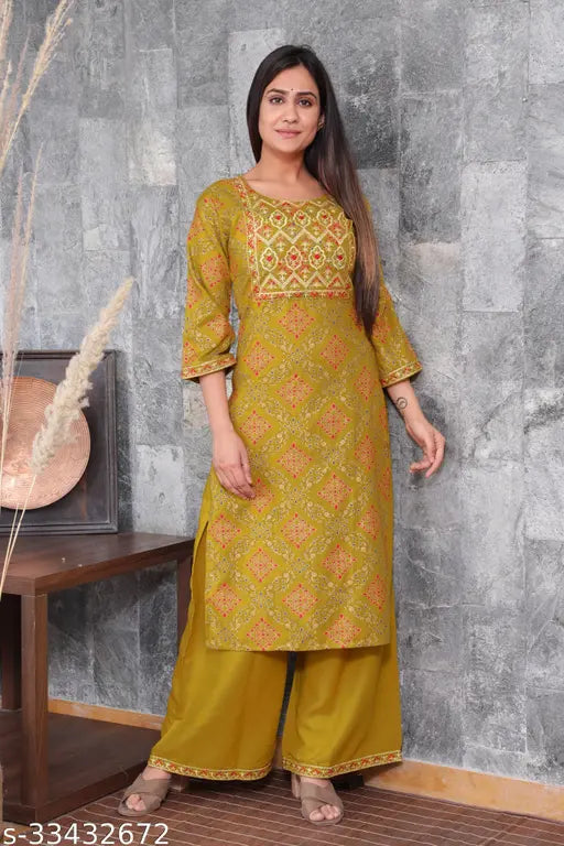 Embroidered rayon kurta set with palazzos, fancy women's three-quarter sleeve outfit from India