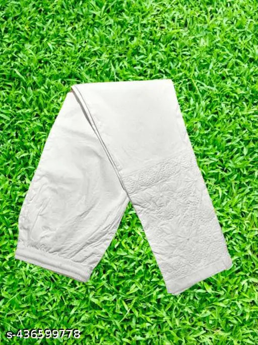 White cotton pant with chikankari embroidery, Lucknawi bottom wear for women. Perfect pairing with kurtas and dresses. Hand wash separately in cold water. Made in India (40 inches length)