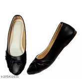 Black synthetic leather brogues, solid pattern with buckle fastening