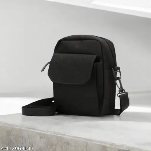 Black fabric sling bag with embroidered net pattern for girls, free size (12in x 12in x 12in), Indian-made handbag accessory