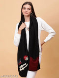 Black wool knitted muffler with embroidered patches, perfect for layered style and warmth