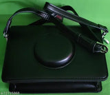 Adjustable black synthetic slingbag, single compartment, self-design net pattern for girls. Handbag on display stand