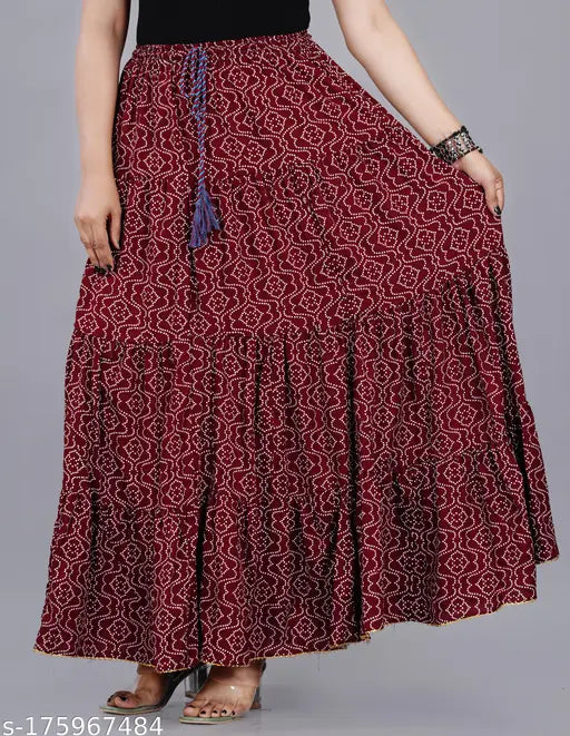 Printed rayon maroon skirt, beautiful and comfortable for women. Size range includes M, L, XL, XXL, XXXL & free size. Made in India, featuring a waist size of 19-25 inches and length size of 46 inches