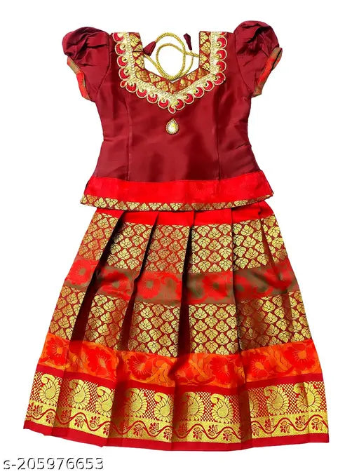 Maroon and golden yellow paisley silk lehenga choli with Pattu Langa jacket for girls, embellished with Zardozi stitch and designer silk finishes. Ideal for weddings, ceremonies, parties, birthdays, and festivals. Hand wash or dry clean recommended