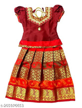 Maroon and golden yellow paisley silk lehenga choli with Pattu Langa jacket for girls, embellished with Zardozi stitch and designer silk finishes. Ideal for weddings, ceremonies, parties, birthdays, and festivals. Hand wash or dry clean recommended