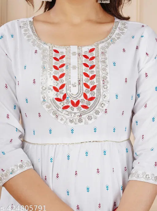 Rayon printed ambroidery kurta with three-quarter sleeves, vibrant Indian traditional attire for women on display