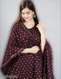 Hand-block printed rayon hip length sleeveless flare kurta with matching dupatta and bottomwear, featuring gold embellishments. Beautiful Indian ethnic wear for women