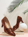 Stylish synthetic leather printed pencil heel pumps for women and girls, trending anti-skid footwear on fashionable feet