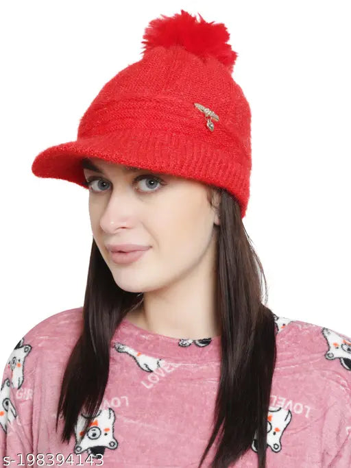 Red wool textured knit skull pompom cap, suitable for women and girls, made with acrylic anti-allergic material. Fits adults and teens with great comfort and versatility, ideal for autumn/winter wardrobes