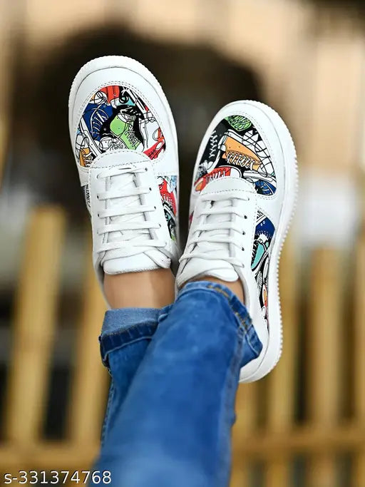 Synthetic white sneakers with printed detail, perfect for girls' casual wear. Lace-up fastening, comfy PU sole from Shoetopia