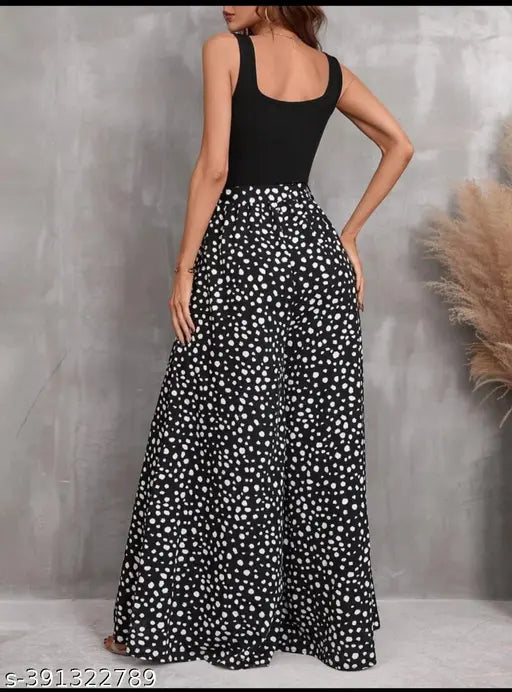 Imported digital print jumpsuit, wide leg flared style in modal fabric. Perfect for any time wear, featuring heavy moss printed fabric with Lycra rib on top