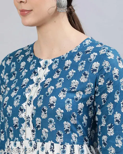 Printed pink rayon anarkali kurti, three-quarter sleeve, Manya women's fashion, Indian clothing on mannequin