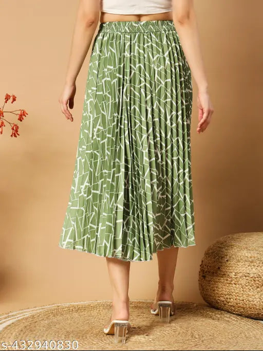 Abstract print crepe midi skirt, elastic waistline, versatile for any occasion, knee-length pleated design. Perfect blend of elegance and style. Available in sizes 26-38 (waist size: hip size). Made in India