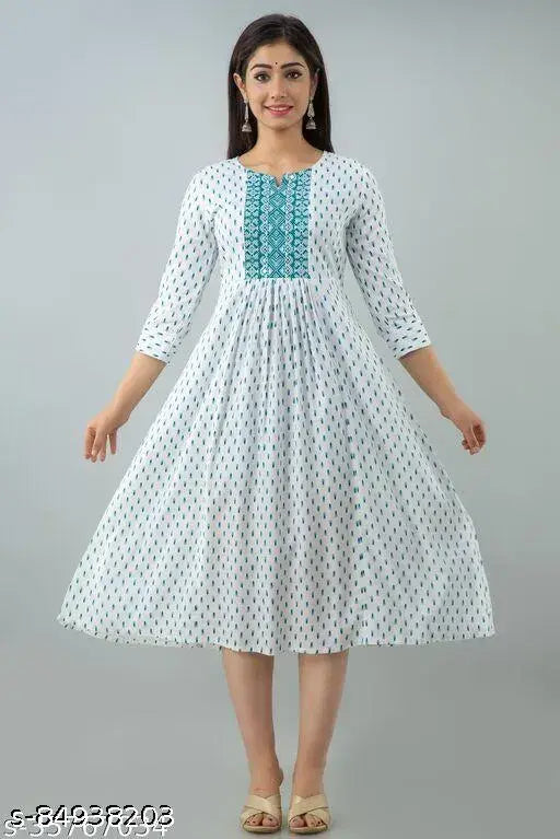 White rayon printed Anarkali kurta with three-quarter sleeves, vibrant floral print on festive Indian fashion wear