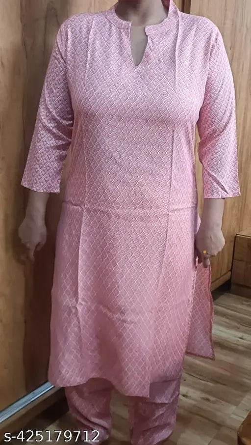 Women's cotton printed kurta and palazzo set with three-quarter sleeves, Indian design on display