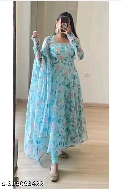 Elegant sky blue Georgette dress with long sleeves, printed net pattern, includes gown and dupatta, size S-XXL. Indian fashion wear for women