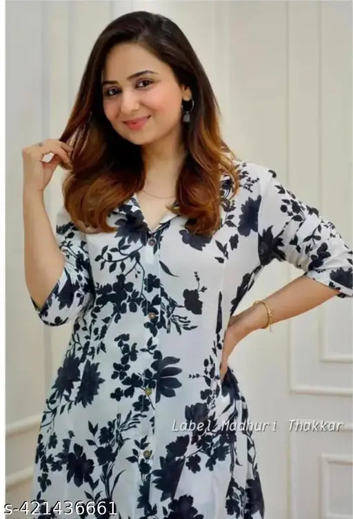 black printed rayon kurta set with matching pants, three-quarter sleeves, India-made fashion for women