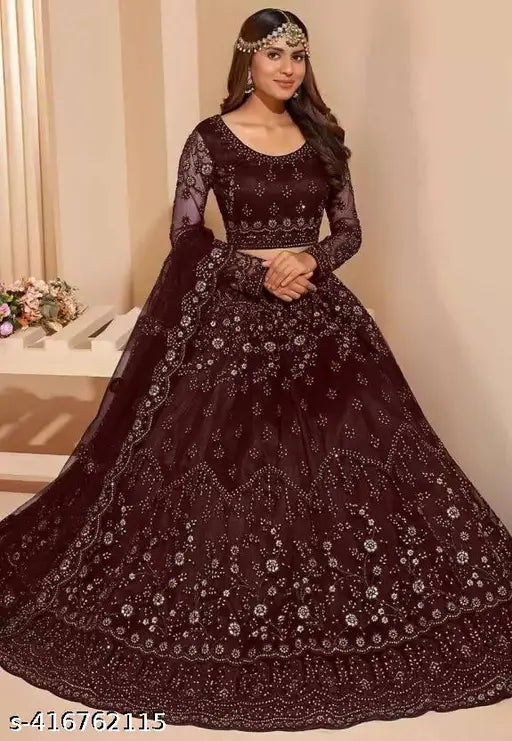 Embroidered net lehenga set in botanical pattern, free size, perfect for women's partywear or bridal attire. Handcrafted in India