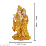 Gold-plated Radha Krishna idol statue, resin, multicolor. Ornate home decor item for living room or pooja room, 11cm L x 11cm W x 19cm H. Perfect gift for various occasions like marriage anniversaries, birthdays, and corporate events. Made in India