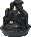 Smoky Poly Resin Adiyogi Shiv Ji Idol, Indian backflow smoke fountain figurine on display