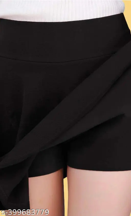 Heavy imported polyester skater skirt, high waistband with attached inner shorts, solid color, flared silhouette, suitable for work or formal occasions. Mid-length, lightweight, durable, breathable fabric. Perfect fit for various body shapes and sizes. Made in India