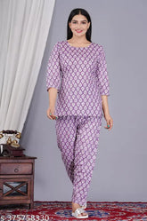 Purple cotton coord set for women, includes top & pyjamas with three-quarter sleeves and printed pattern. High-quality accessory set for versatile style, crafted in India