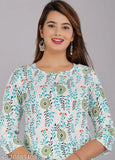 Attractive white and perot color rayon floral print kurta pant set with palazzo bottoms, three-quarter sleeves