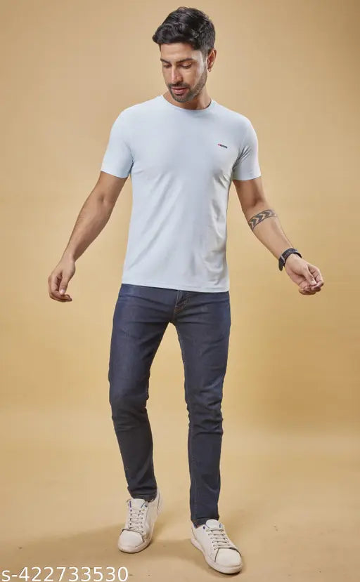 Black/white polyester casual t-shirt by Vestor Blooms, ideal for layering with cargos and jeans. Made in India