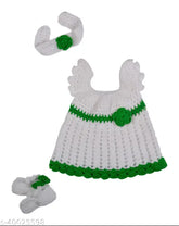 Green and white hand-knitted crochet baby frock, colorblocked woolen dress with sleeveless design for 0-6 months