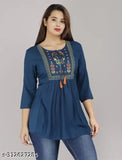 Teal blue rayon short kurta, embroidered three-quarter sleeve top for women, latest trending fashion from Suraj Pari Singh, originated in India