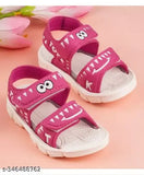 Pink cotton sandal with TPR sole, featuring Angry Birds pattern and buckle fastening. Ideal for boys aged 9-12 months. High-quality children's shoe from India