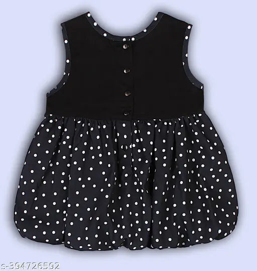 Black polka dotted cotton blend balloon dress with charming bow detail, size 6-5 years, India origin