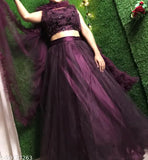 Wine jute silk flared lehenga choli set with net dupatta, featuring ruffle patterns for women's Bollywood partywear