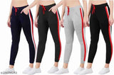 Striped cotton blend pocket joggers for women and girls, pack of 4 - versatile, stretchable, and comfortable for sports and yoga. Available in various colors, sizes range from 26 to 32 inches. Made in India