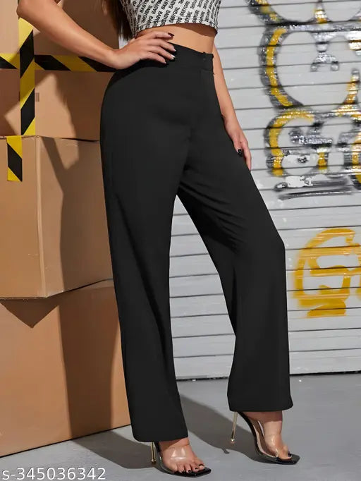 Cotton blend solid net women's trousers and pants, size 26/28/30/32/34 with waist 26/28in, length 36/37/37/38/38in, hip 26/28/30/32/34in. Indian-made trousers for women on display