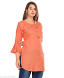 Women's pink rayon casual top with embellished net pattern, three-quarter sleeves. Beautifully feminine and elegant, this handcrafted Indian piece is perfect for relaxed afternoon events