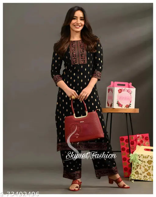 Rayon printed kurta pant set, fashionable three-quarter sleeves palazzo bottoms with net pattern - India