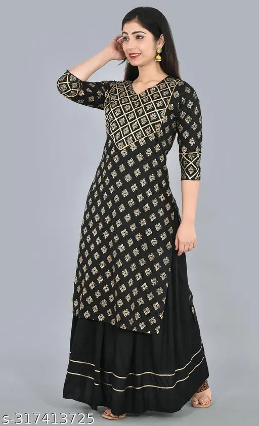 Black rayon straight kurta with skirt set, embellished net pattern with gold print gota lace, 3/4th sleeves, knee-length (46 inches), ideal for dating, parties, casual wear, travel, home, office, night out, gifting, beach. Authentic Liyara brand product from India