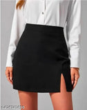 Black high-waisted midi pencil skirt with slit hem, polycotton material. Perfect for daily, casual, and office wear. High elastic fabric and elastic waistband ensure a comfortable fit. Available sizes: 26, 28, 30, 32, 34, 36, made in India